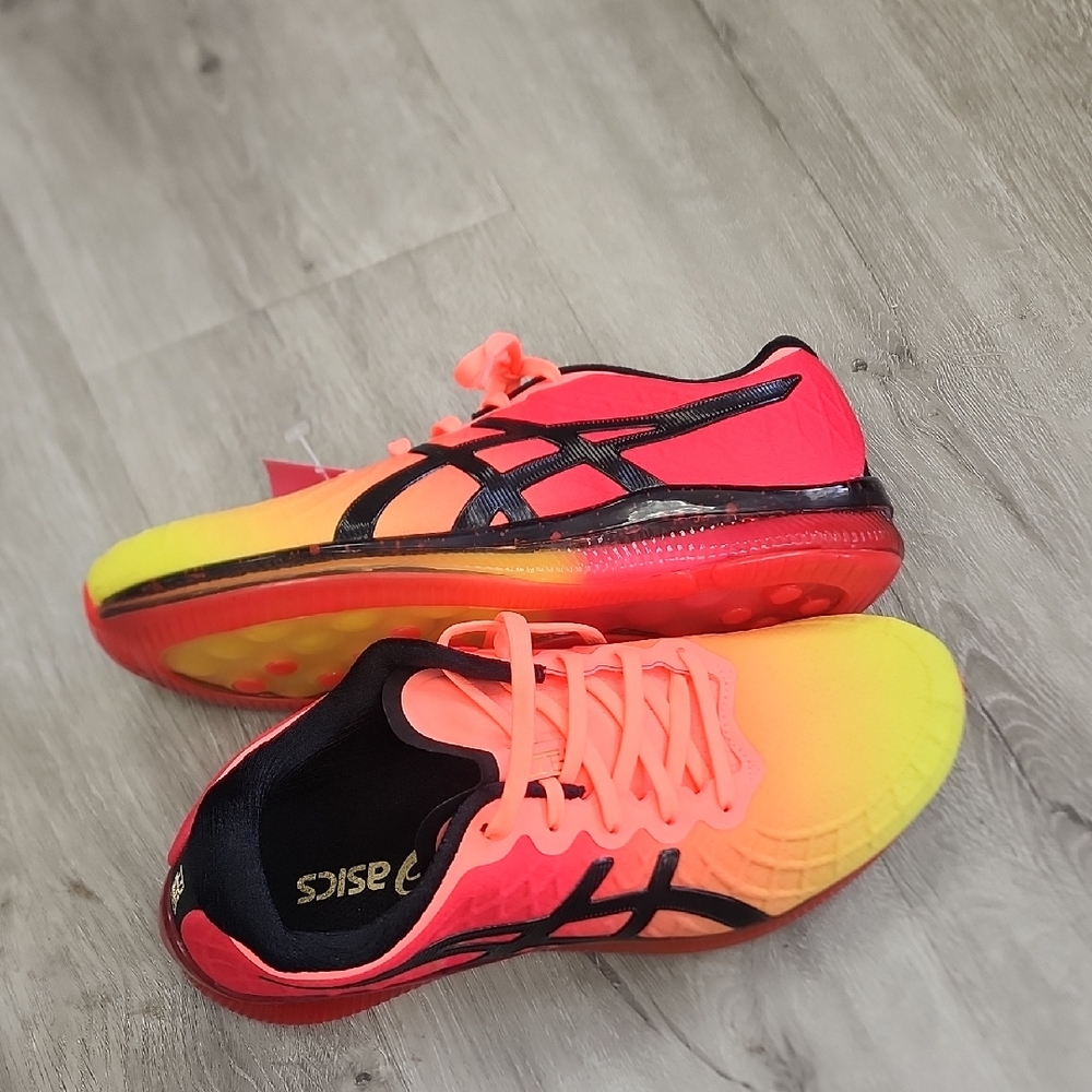 GEL-Quantum Infinity running shoes in the 'Red Sour Yuzu' colorway. Asics